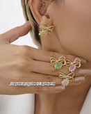 گوشواره طرح جواهر گره پاپیونی با سنگهای رنگی و نگین های زیرکونیا آبکاری طلای ۱۸ عیار