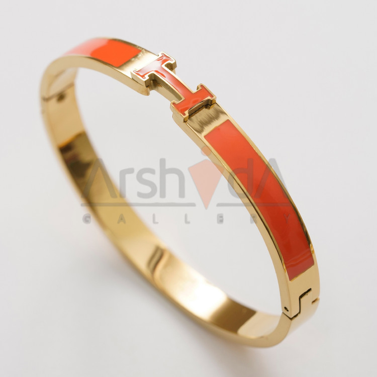 دستبند زنانه هرمس با طراحی لوکس میناکاری نارنجی