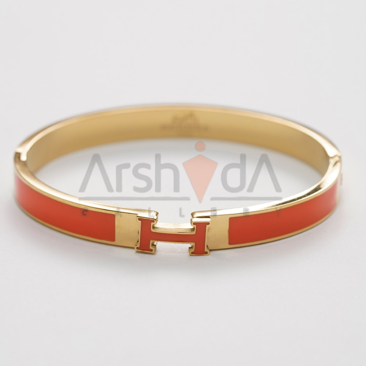 دستبند زنانه هرمس با طراحی لوکس میناکاری نارنجی