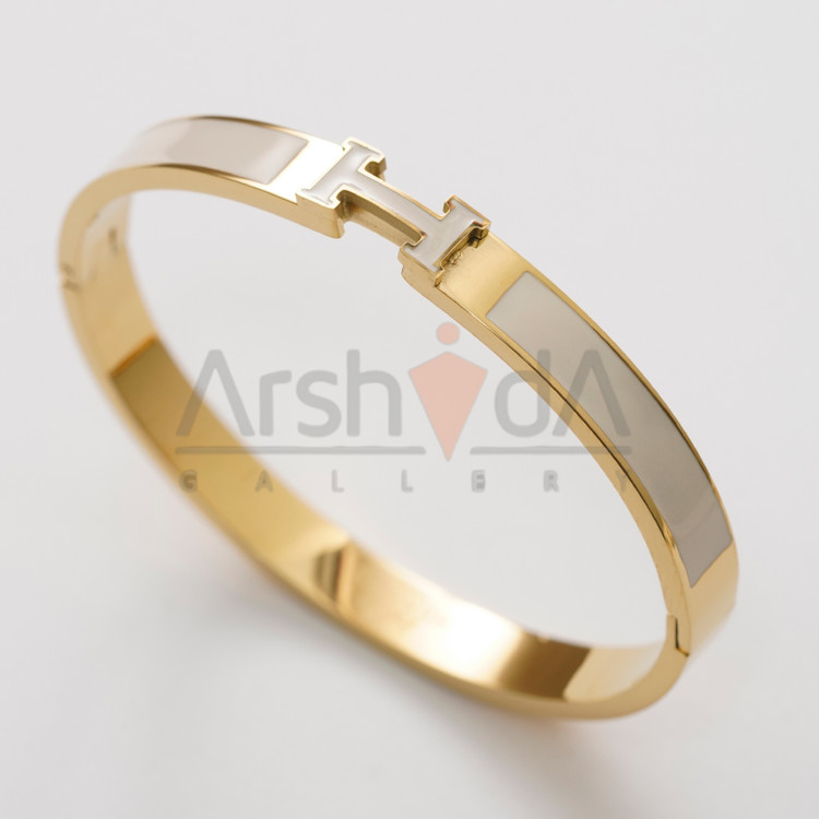 دستبند زنانه هرمس با طراحی لوکس میناکاری کرم