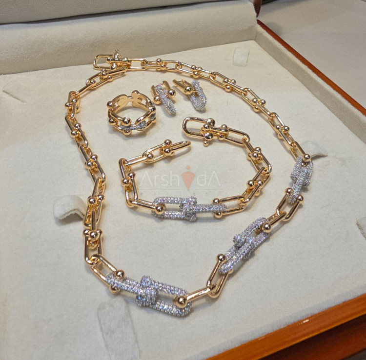 سرویس گردنبند، دستبند، گوشواره و انگشتر تیفانی رنگ شامپاینی با آبکاری طلای ۱۸ عیار و رنگ ثابت