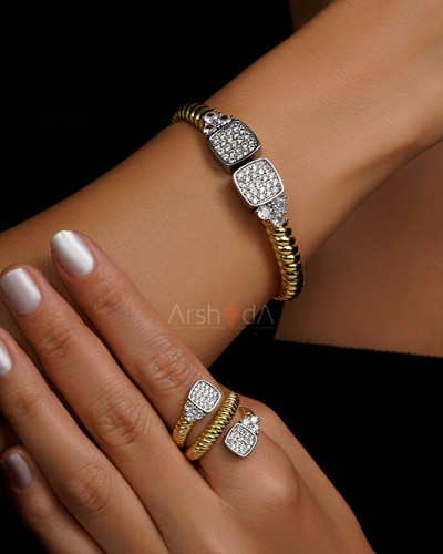 ست زنانه دستبند و انگشتر مدل توییست نگیندار با آبکاری طلا ۱۸ عیار