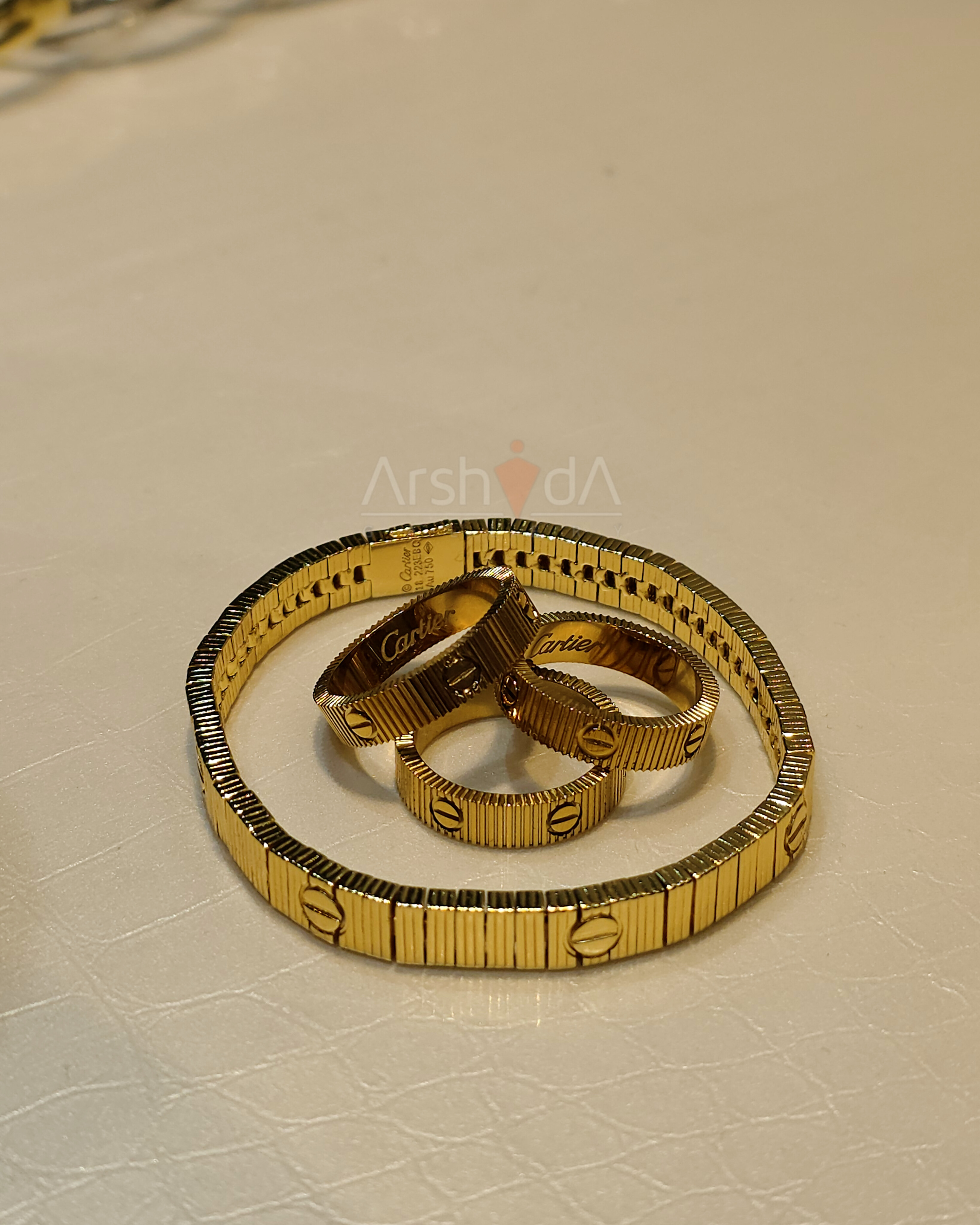 ست دستبند و انگشتر آنلیمیتد لاو کارتیر استیل با آبکاری طلا